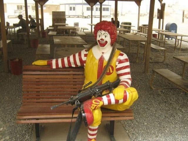 Ronald McDonald Holding a Gun